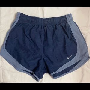 Blue women’s Nike running shorts.